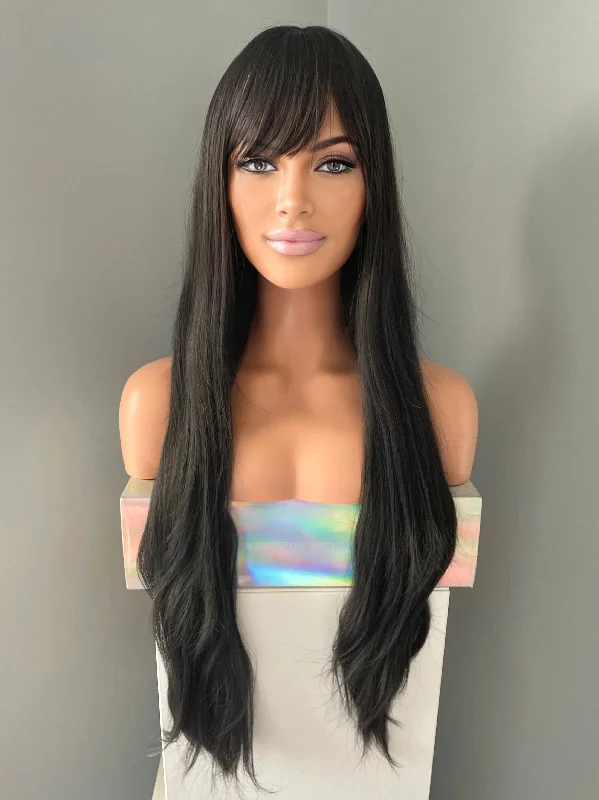 Bob wig in a jet - black color for a classic appearance"Ingrid" - Long Black Silky Straight Wig with Bangs