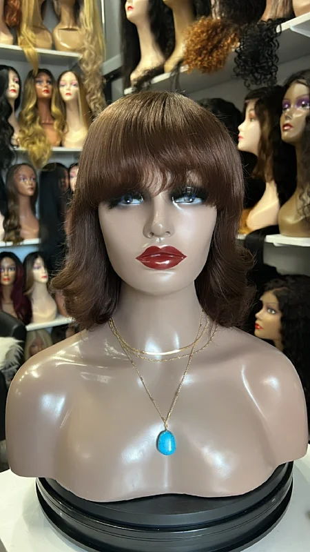 Human - hair wig with a straight texture for a sleek and minimalist lookNicola