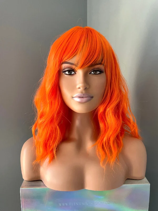 Bob wig with a balayage effect for a natural - looking color transition"Rae" - Short Neon Orange Wig With Bangs