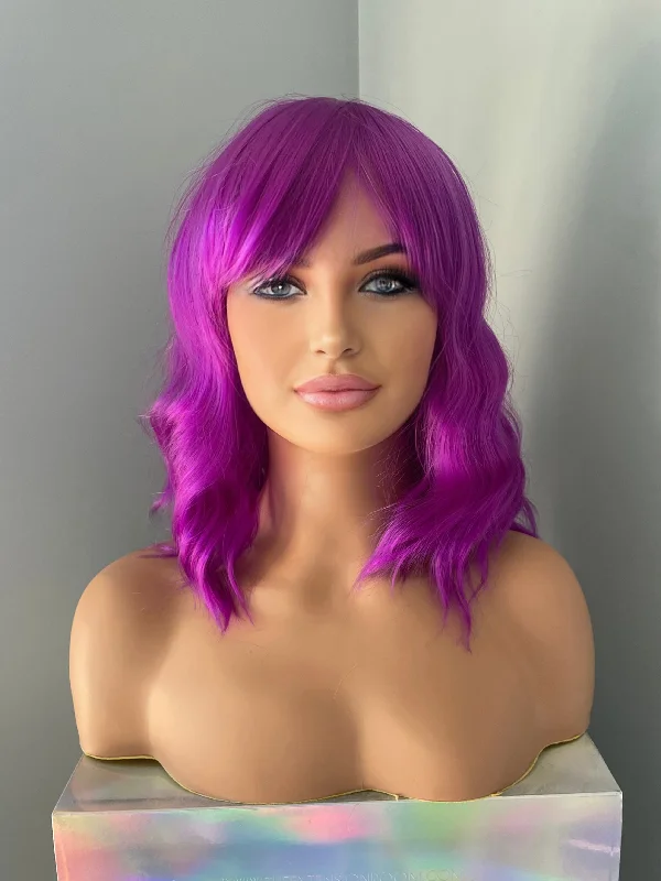 Bob wig with a blunt cut for a modern and edgy style"Sable" - Short Neon Purple Body Wave Wig with Bangs