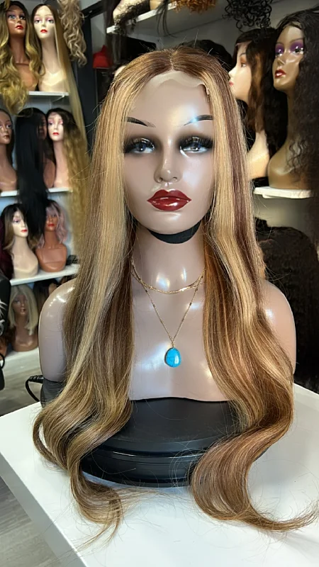 Human - hair wig with a honey - blonde color for a warm and sunny lookShelia 28