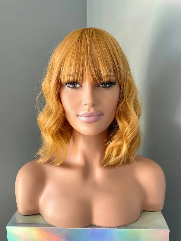 Layered bob wig to add volume and dimension"Soleil" -  Short Orange Yellow Wig with Bangs