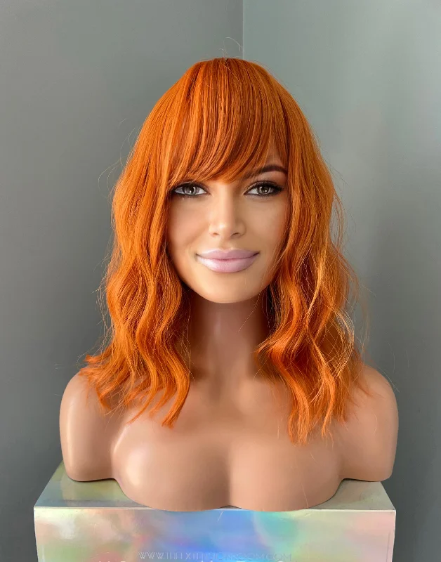 Bob wig made from high - quality synthetic fibers"Tangerine" - Short Orange Wig with Bangs